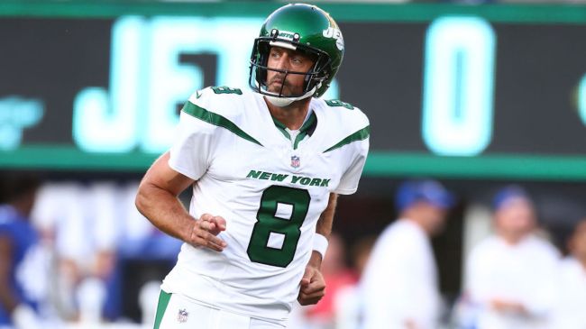 aaron rodgers in a white jets jersey