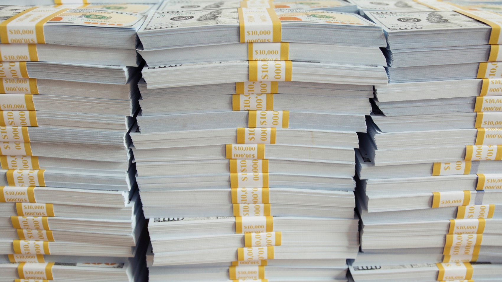 stacks of new $100 bills