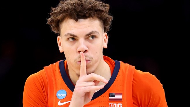 Illinois forward Coleman Hawkins quiets the crowd during a game.