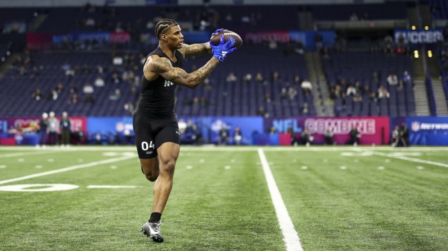 Keon Coleman runs a drill at the NFL Combine.