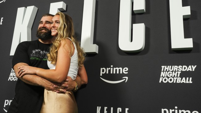 Jason and Kylie Kelce pose for a photo.