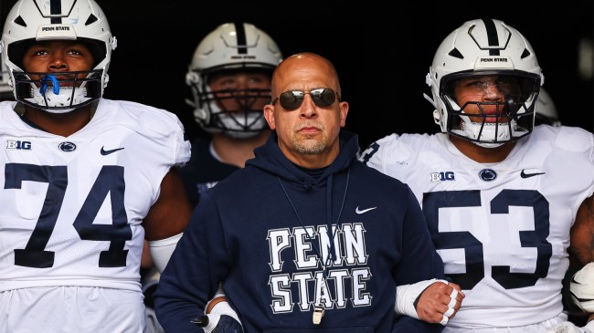 Penn State head coach James Franklin leads the team onto the field