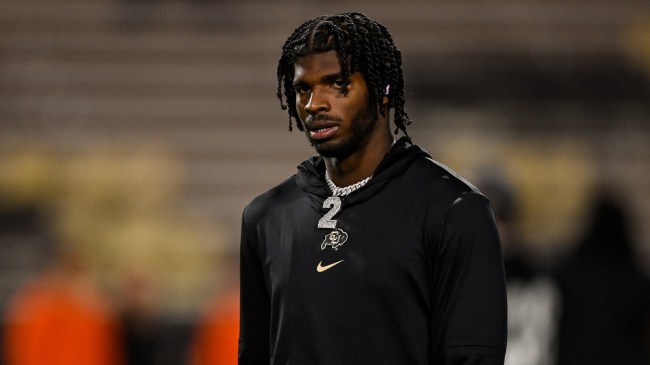 Shedeur Sanders warms up before a Colorado football game.