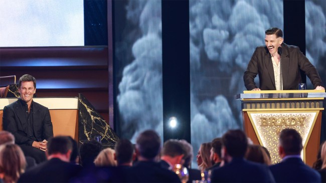 Tom Brady and Andrew Schulz onstage during Greatest Roast Of All Time