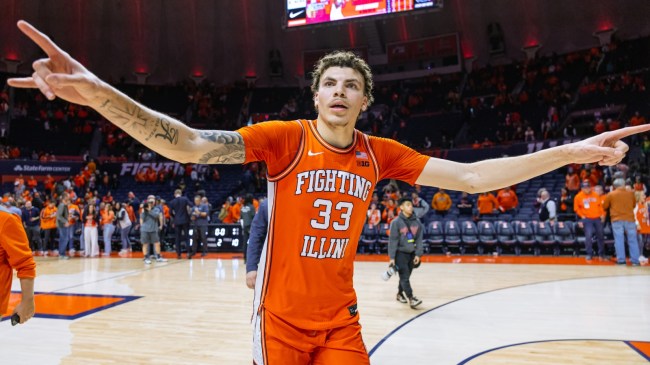 Coleman Hawkins celebrates after an Illinois basketball game.