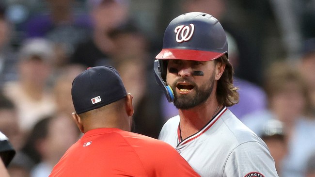 Nationals outfielder Jesse Winker argues with an umpire.