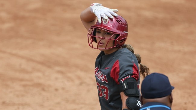Oklahoma softball player Alyssa Brito celebrates on the basepaths.