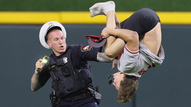Reds streaker doing a backflip
