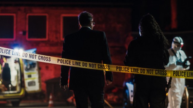 Dangerous Crime Scene Forensics Team Gathering Evidence