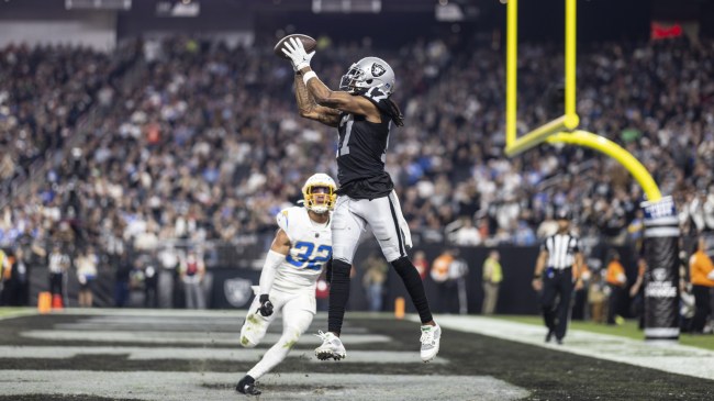 Raiders WR Davante Adams catches a touchdown vs. the Chargers.