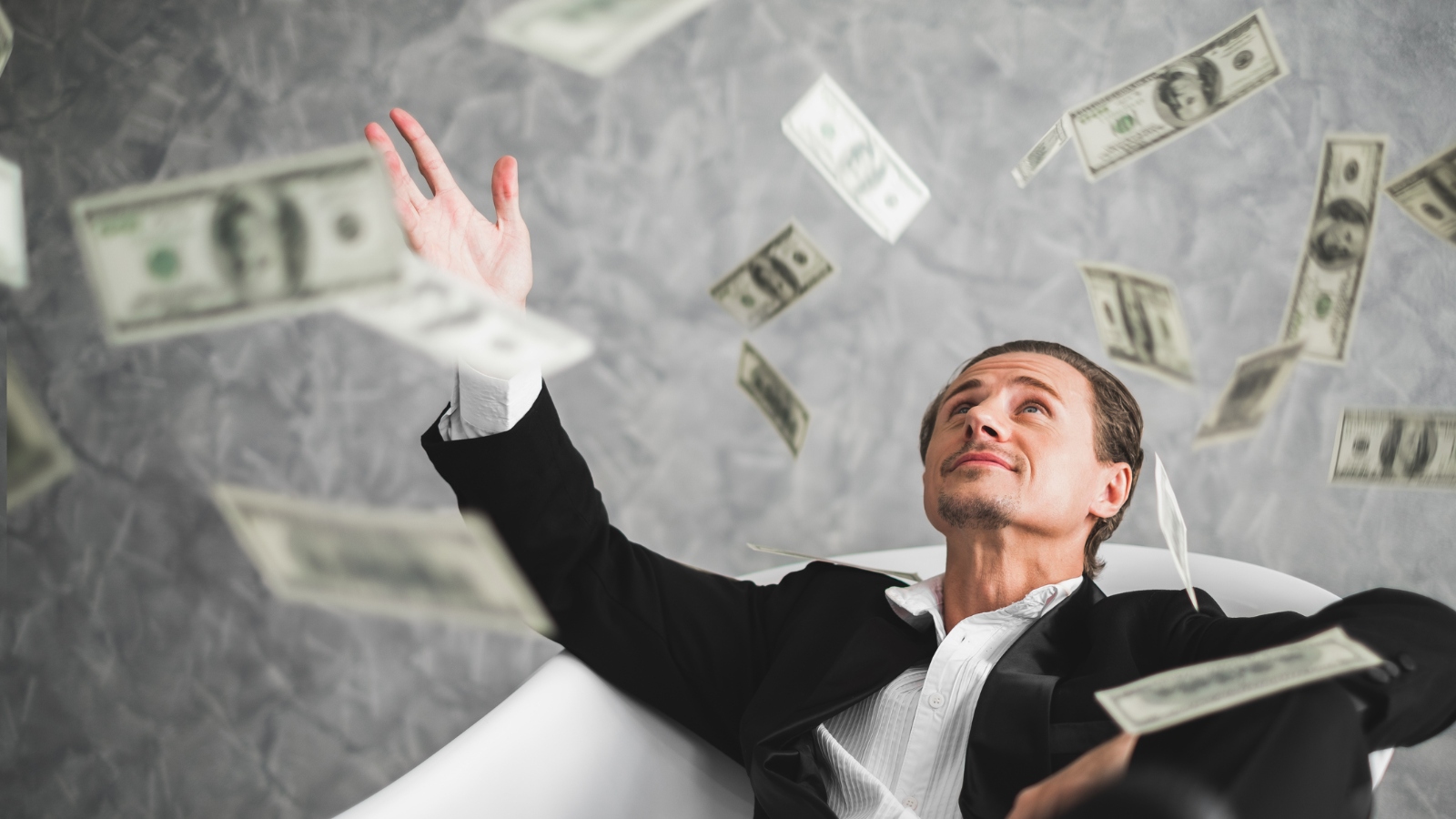 raining money into bathtub
