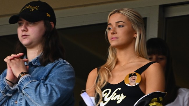 Livvy Dunne watches from the stands as Paul Skenes pitches for the Pittsburgh Pirates.