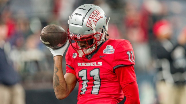 UNLV WR Ricky White celebrates a touchdown.