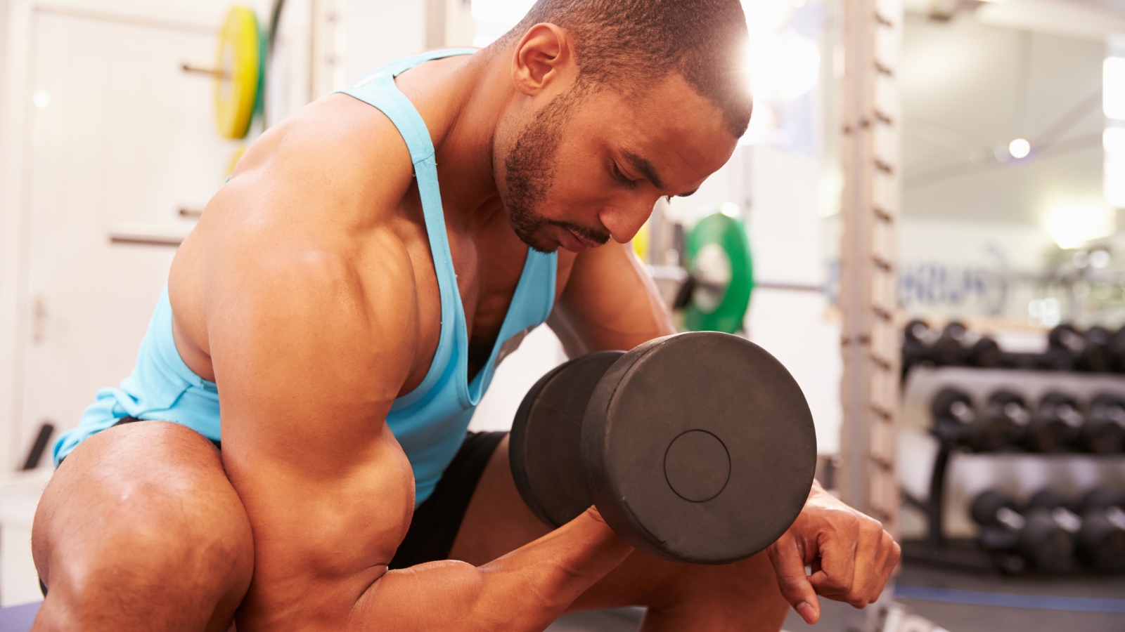weight lifter doing bicep curls