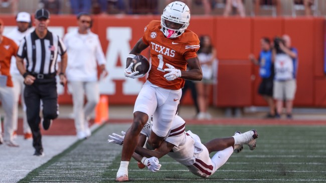 Texas WR Johntay Cook runs down the sidelines.