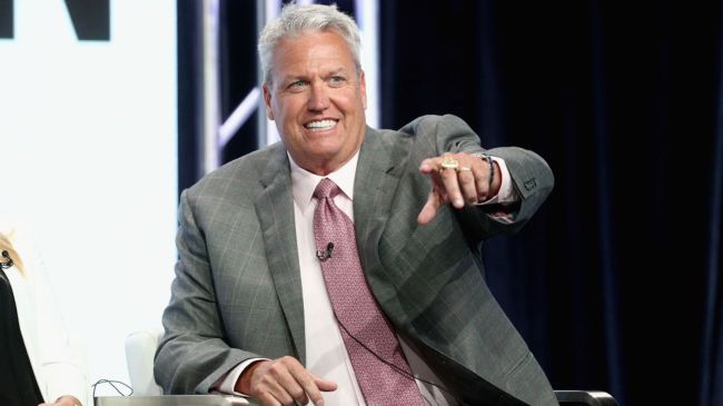 rex ryan in a grey suit