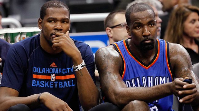 Jan 18, 2015; Orlando, FL, USA; Oklahoma City Thunder forward Kevin Durant (35) and center Kendrick Perkins (5) look on from the bench against the Orlando Magic during the second half at Amway Center. Oklahoma City Thunder defeated the Orlando Magic 127-99. Mandatory Credit: Kim Klement-USA TODAY Sports