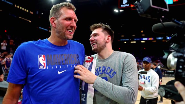 May 15, 2022; Phoenix, Arizona, USA; Dallas Mavericks guard Luka Doncic (77) greets former player Dirk Nowitzki after beating the Phoenix Suns in game seven of the second round for the 2022 NBA playoffs at Footprint Center. Mandatory Credit: Mark J. Rebilas-USA TODAY Sports