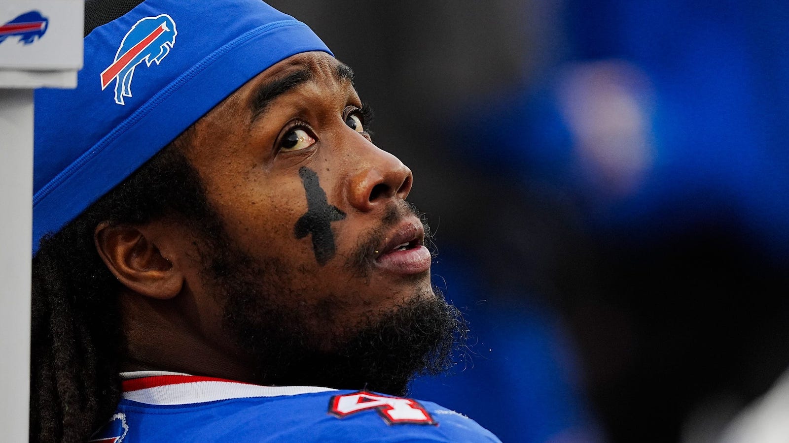 Buffalo Bills running back James Cook (4) takes a breather while the defensive line is on the field during second half of the Bills home game against the New York Jets at Highmark Stadium in Orchard Park on Dec. 29, 2024.