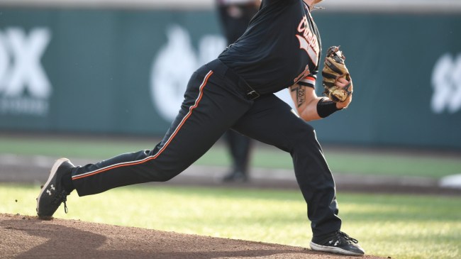 A Campbell Camels baseball player deliver a pitch.