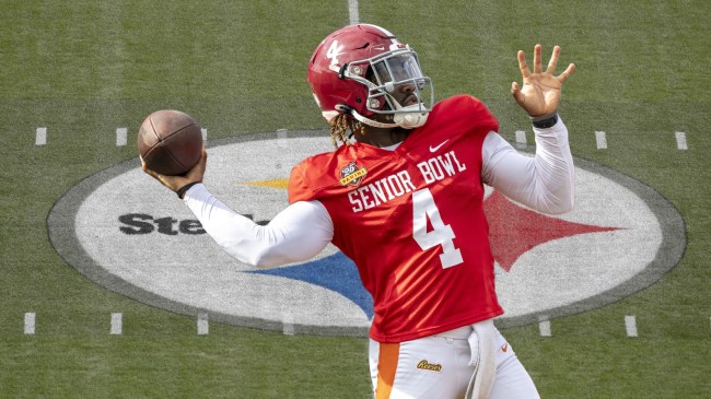 Alabama QB Jalen Milroe throws a pass at the Senior Bowl.