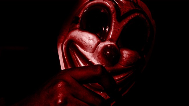 creepy clown figure in the dark