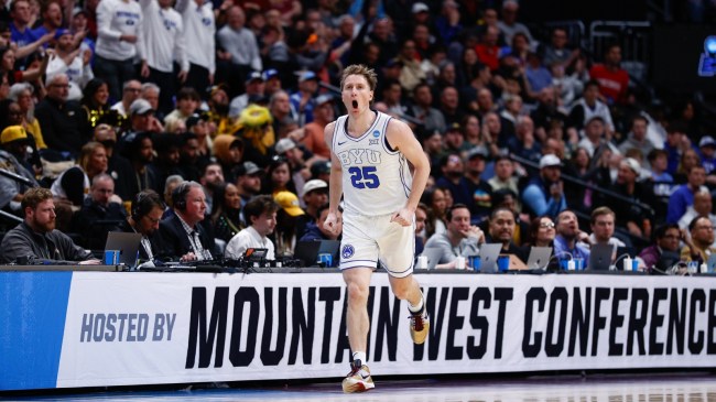 BYU basketball player Dawson Baker runs on the court.