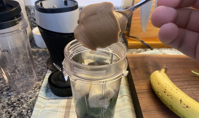 Adding peanut butter to cup