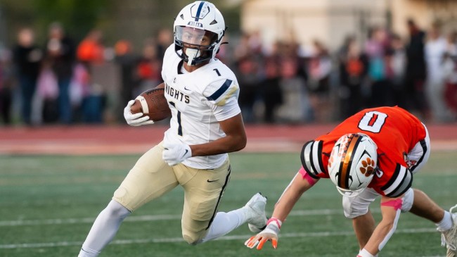 Elbert Hill runs past a defender