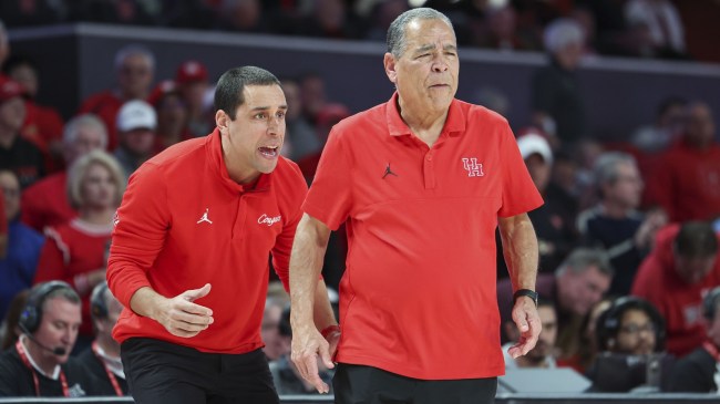 Kelvin Sampson alongside son, Kellen, during a Houston basketball game.