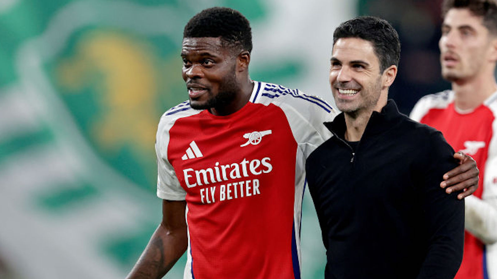 LISBON, PORTUGAL - NOVEMBER 26: Thomas Partey of Arsenal, coach Mikel Arteta of Arsenal celebrating the victory during the UEFA Champions League match between Sporting CP v Arsenal at the Estadio Jose Alvalade on November 26, 2024 in Lisbon Portugal (Photo by Eric Verhoeven/Soccrates/Getty Images)