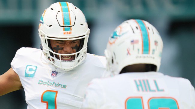 Tua Tagovailoa and Tyreek Hill