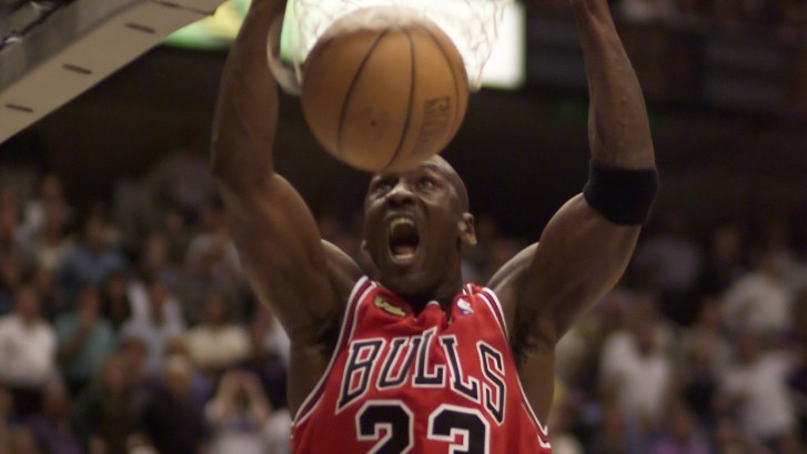 Michael Jordan dunking the basketball with the Bulls
