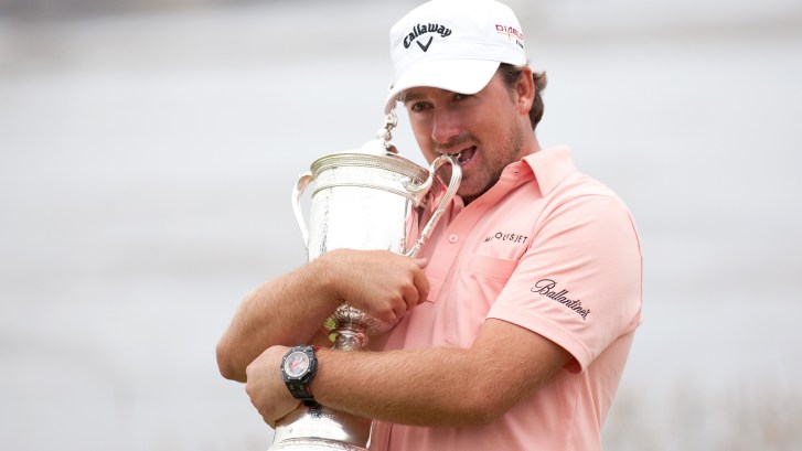 Graeme McDowell hugging U.S. Open trophy in 2010