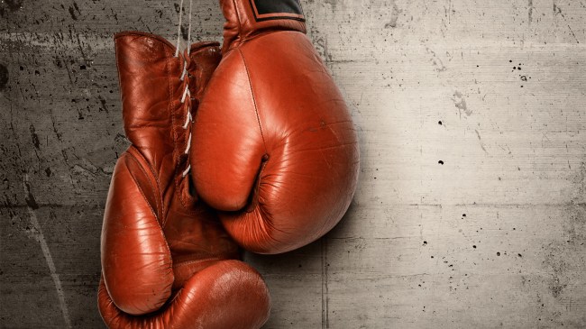 Boxing-gloves-hanging-on-concrete-wall