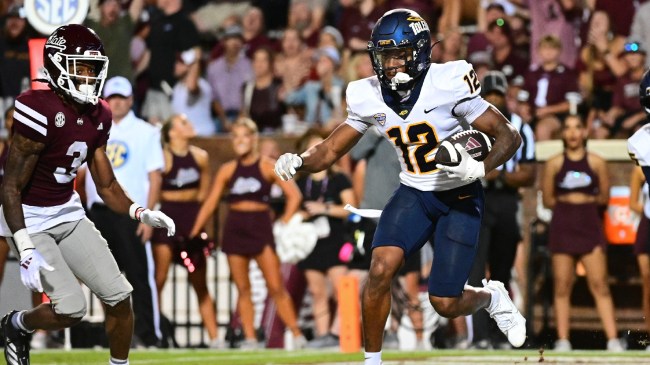 Avery Smith intercepts a pass during a game between Toledo and Mississippi State.