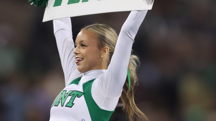 North Texas Mean Green football cheerleader