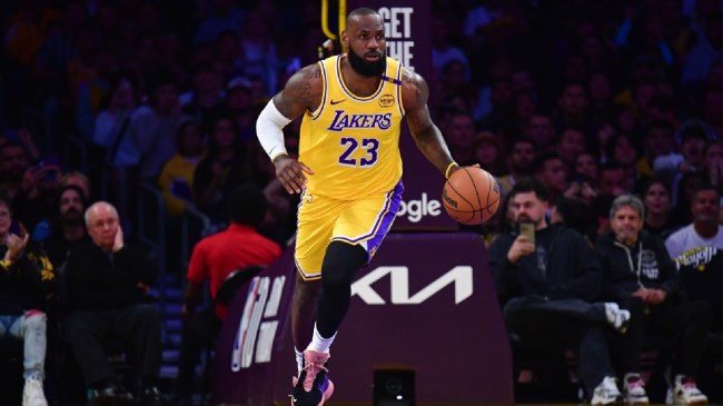 LeBron James dribbles up the court