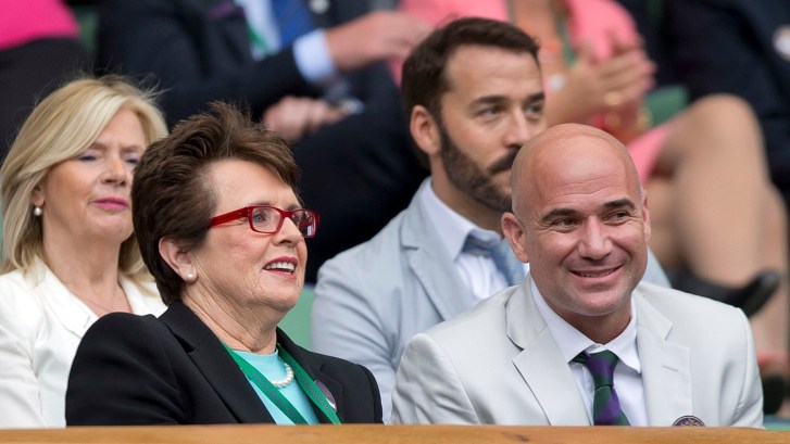 Billie Jean King sits with Andre Agassi at Wimbledon Championships