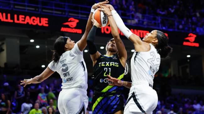 NaLyssa Smith blocks a shot by DiJonai Carrington.